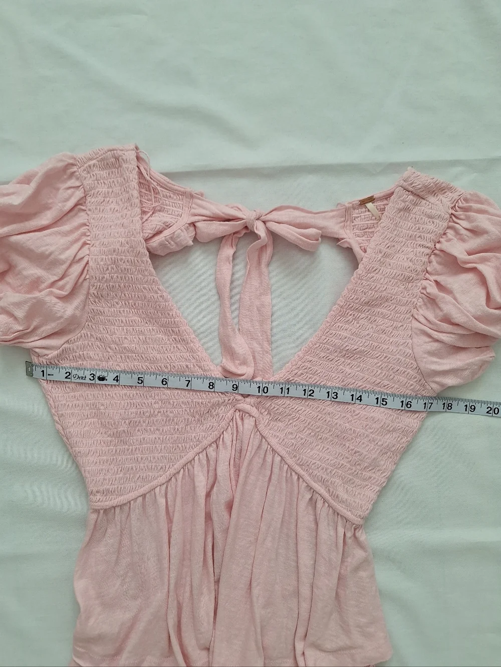 Free People Light Pink Smocked V-Neck Peplum Blouse